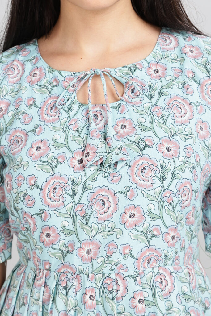 Pastel bloom cotton midi dress fabric print closeup breathable cotton