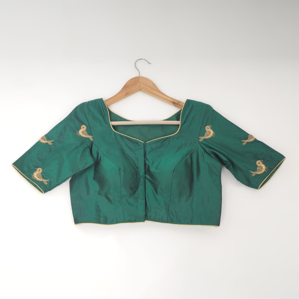 Green silk blouse bird motif zardozi embroidery closeup detail
