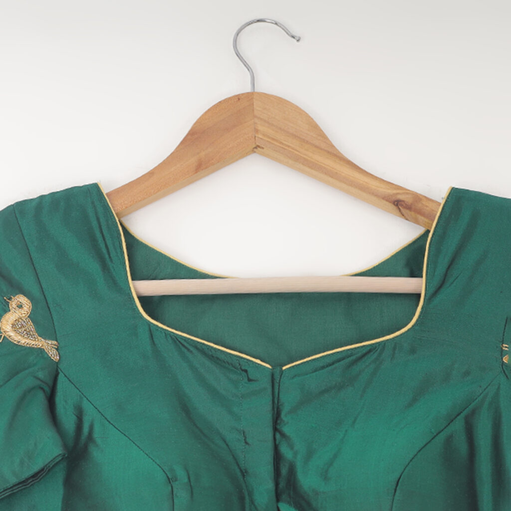 Green silk embroidered blouse back design ready made with tassels