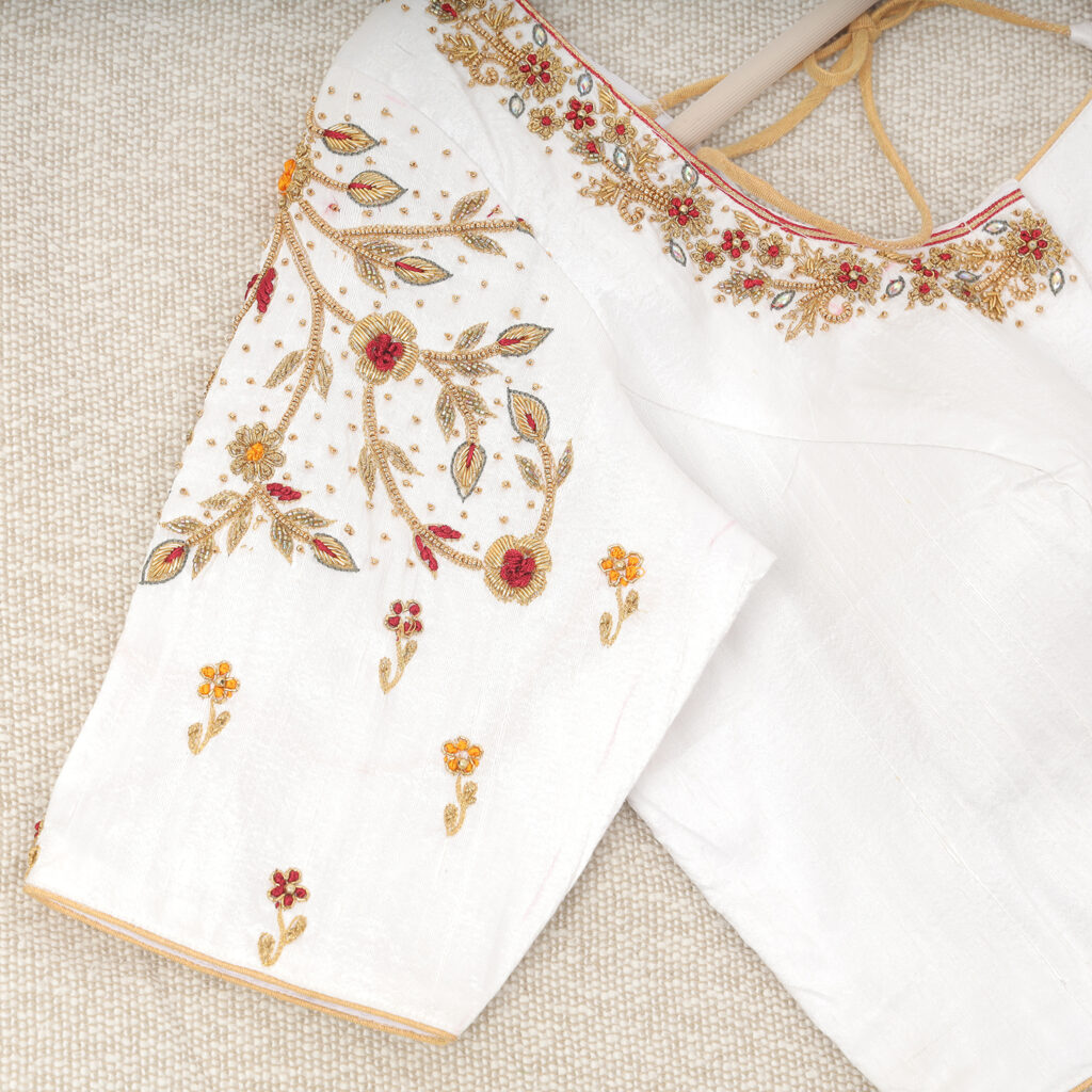 White silk Aari work handwork blouse sleeve embroidery detail