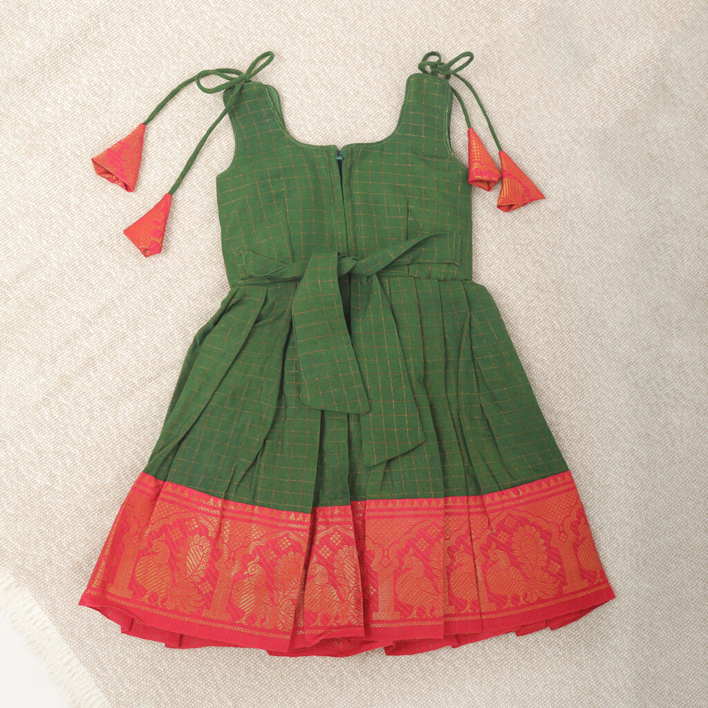 Back view of Amora green and red traditional kids festive frock