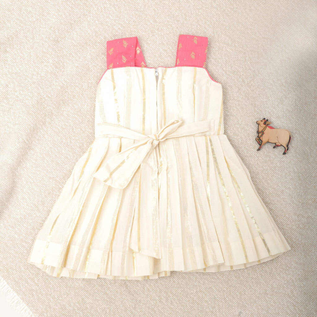 Back view of cream and pink traditional kids frock