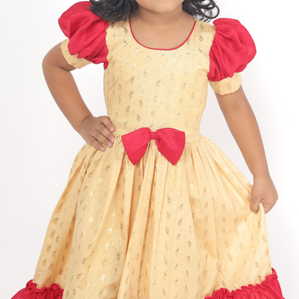 Close up ruffle detail of Taara pink kids frock