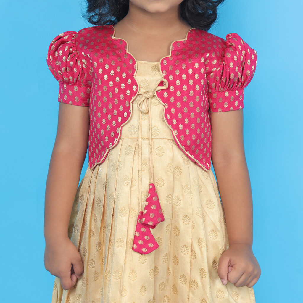 Close up detail of Taara beige pink kids dress