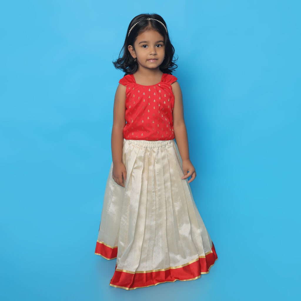 Side of Taara red and ivory ethnic lehenga set for girls