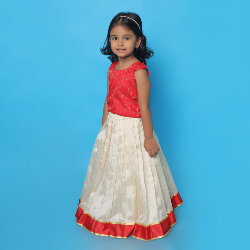 Side view of Taara red and ivory ethnic lehenga set for girls