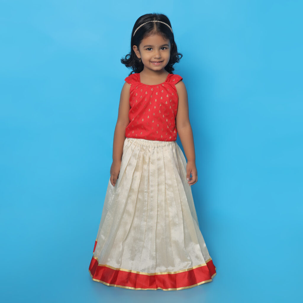 Front view of Taara red and ivory ethnic lehenga set for girls