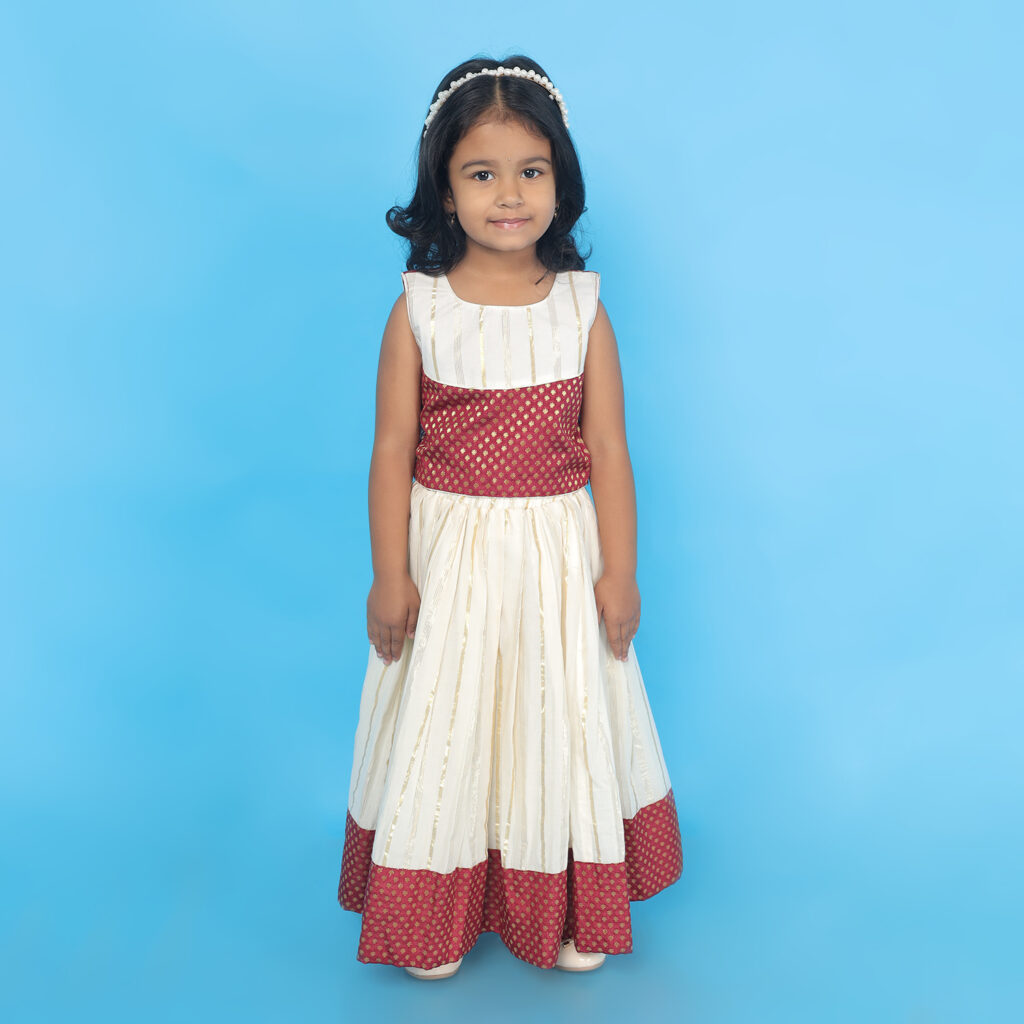 Front view of Nila ivory and maroon ethnic lehenga set for girls