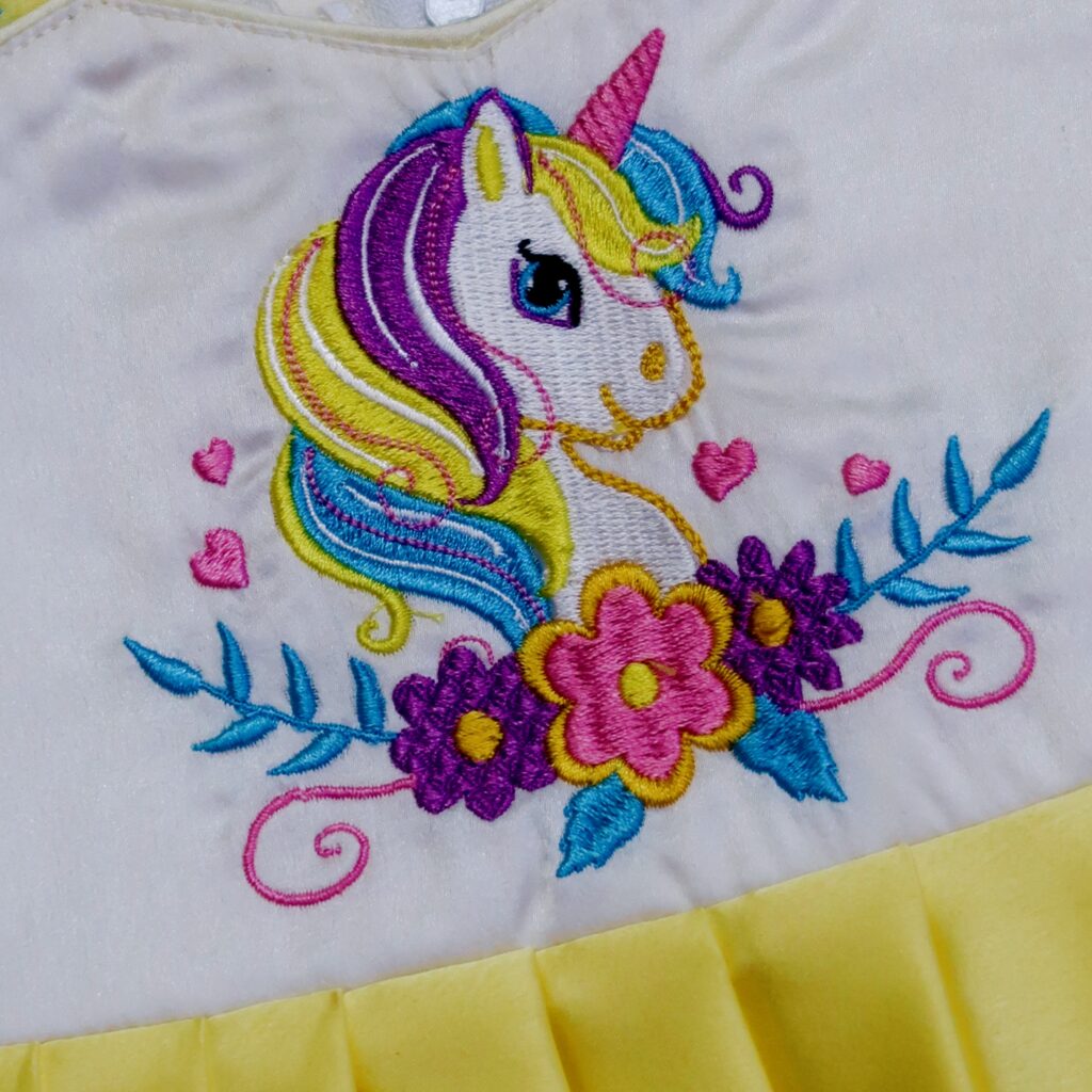 front view Nigal Mathi yellow unicorn embroidered kids frock ready stock