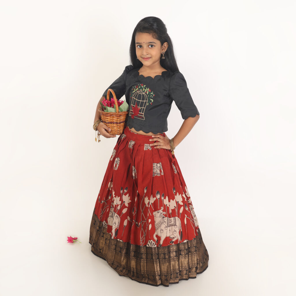Side view black silk crop top with scallop sleeves Kalamkari lehenga dress