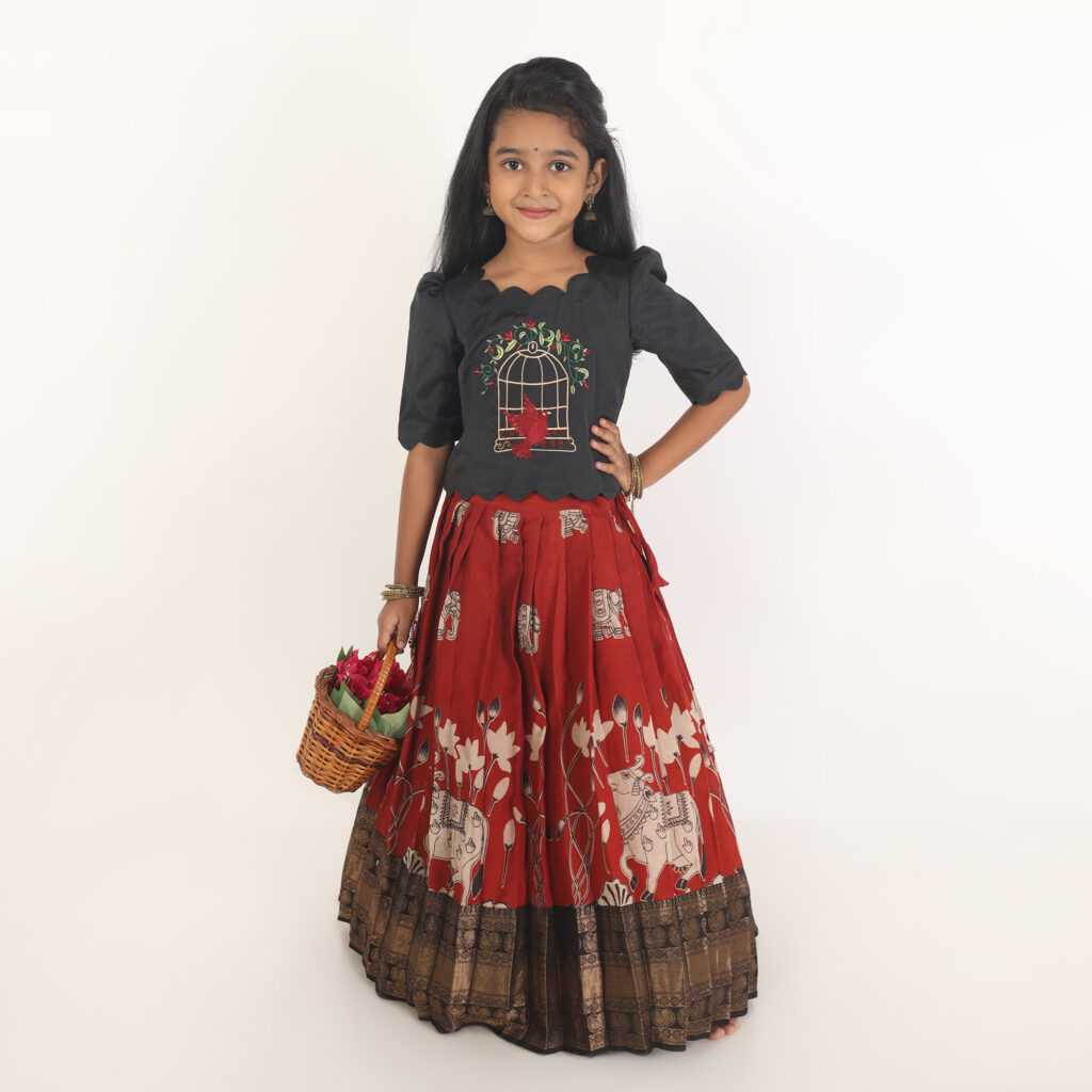 Red Kalamkari printed skirt detail festive wear for girls