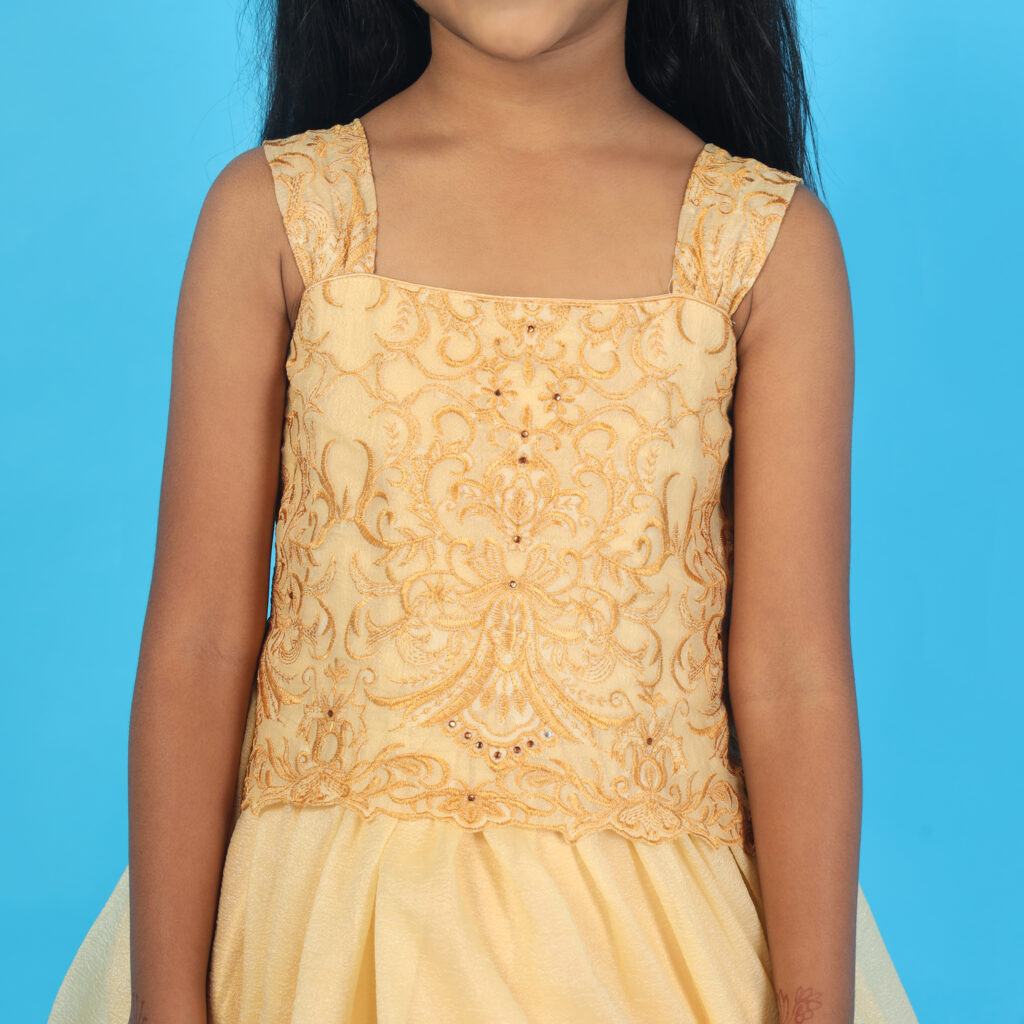 Closeup embroidery detail elegant yellow kids gown premium craftsmanship