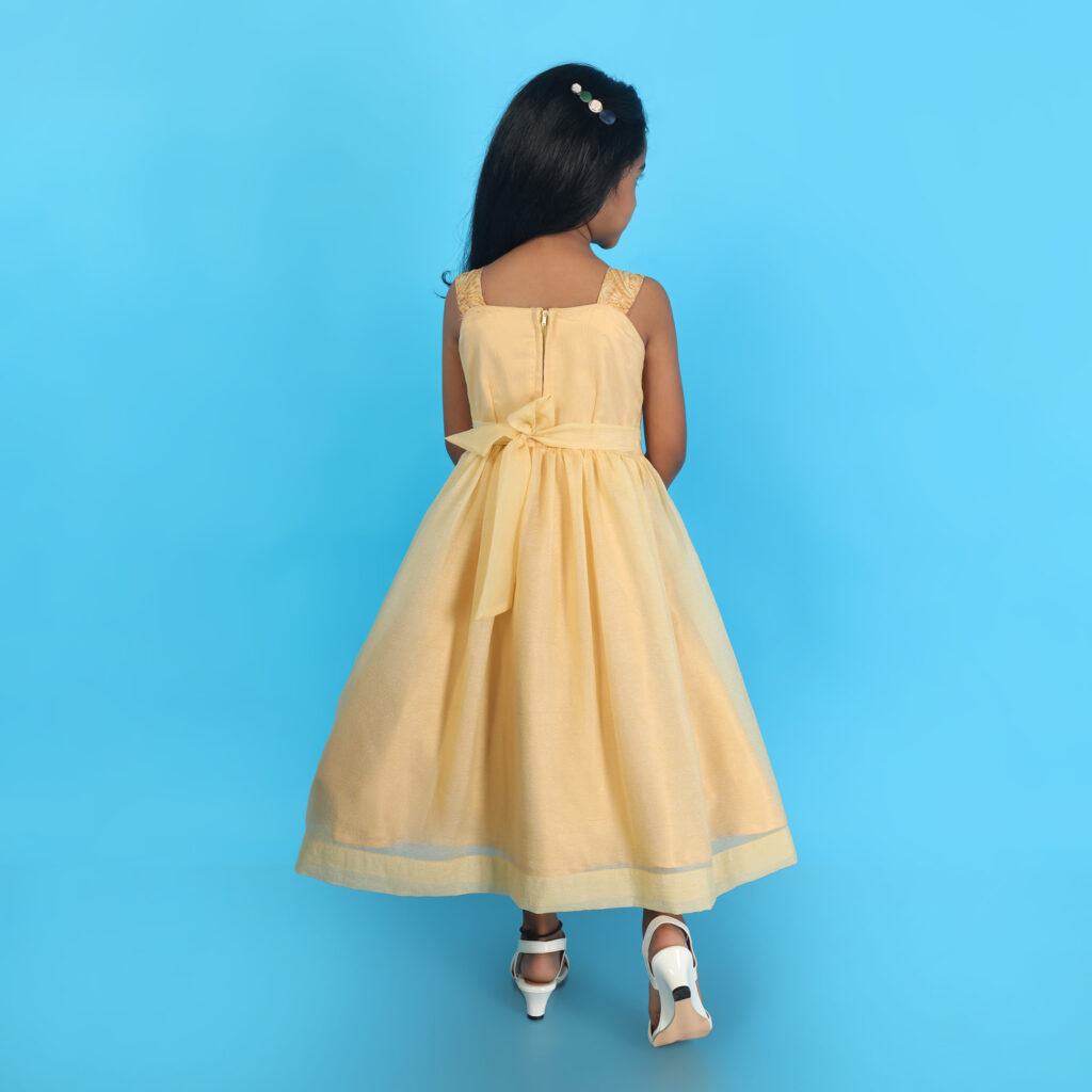 Back view yellow embroidered kids gown with full length flare designer outfit