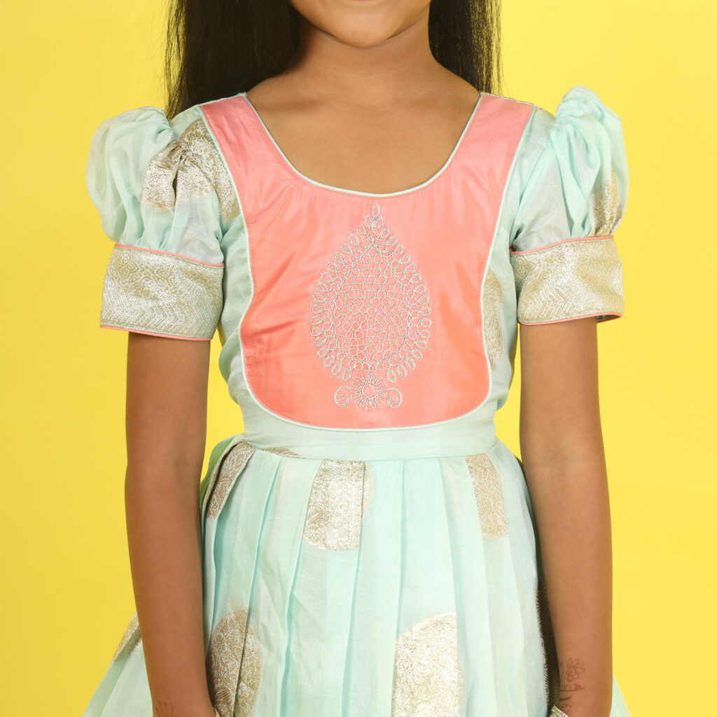 Close up cording embroidery bodice sea green peach gown
