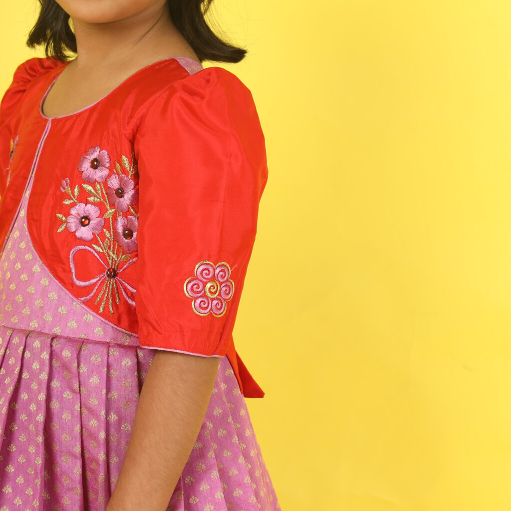 Girls silk festive long gown with purple butta printed silk and red bodice front view