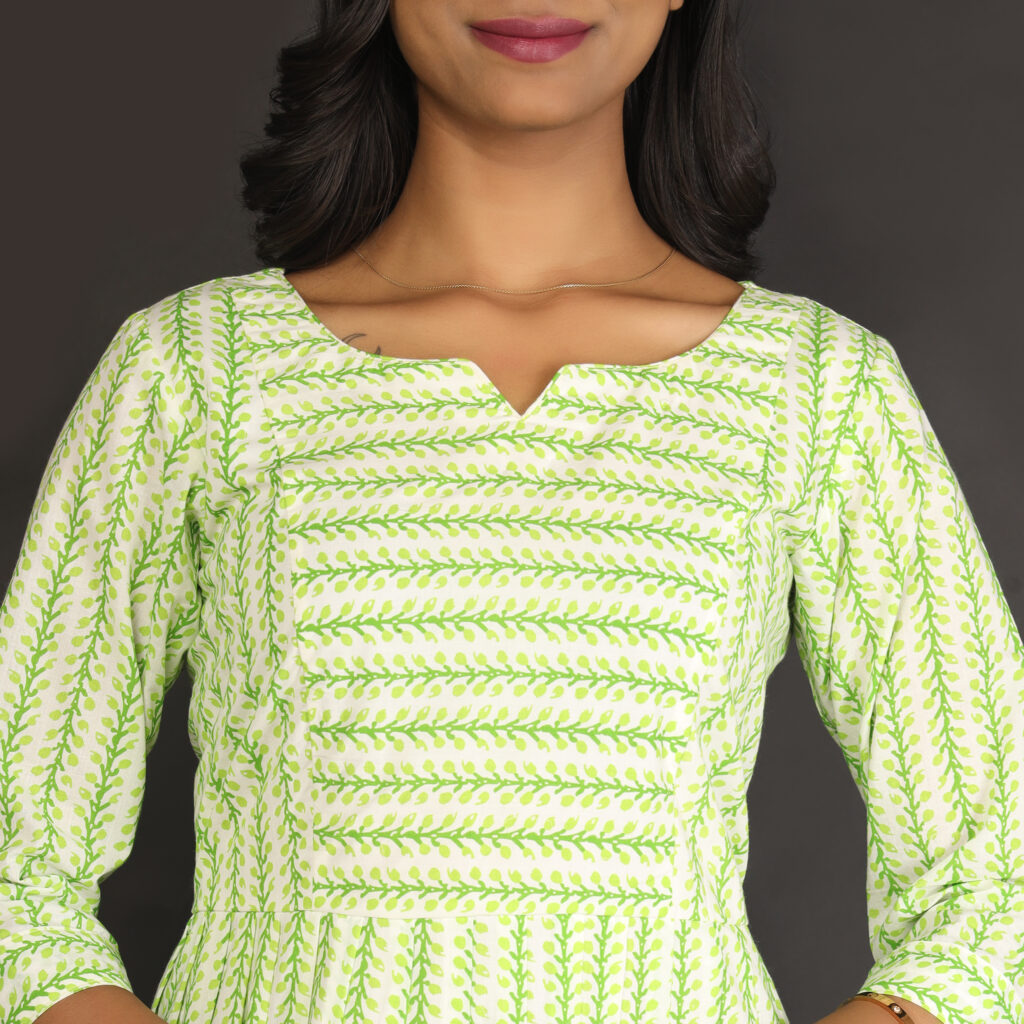 Light green handblock print cotton dress fabric closeup breathable cotton