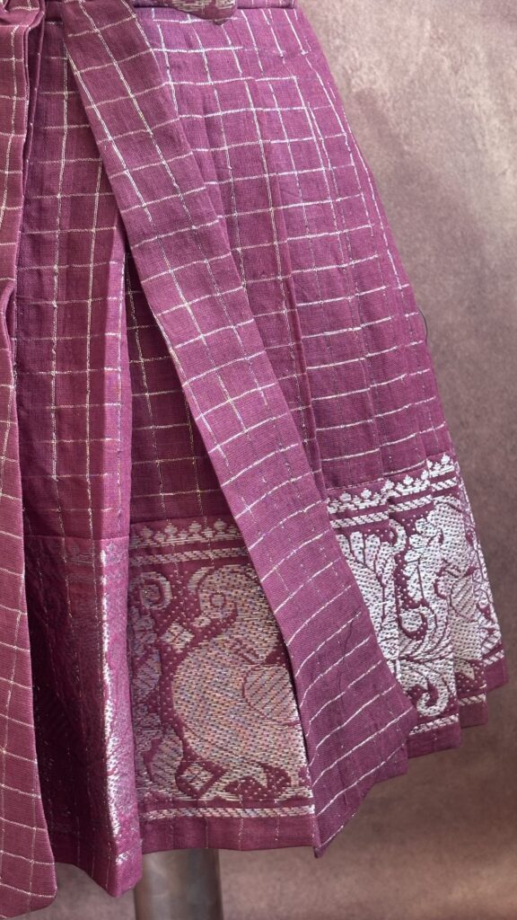 Pleated skirt detail of purple traditional kids frock