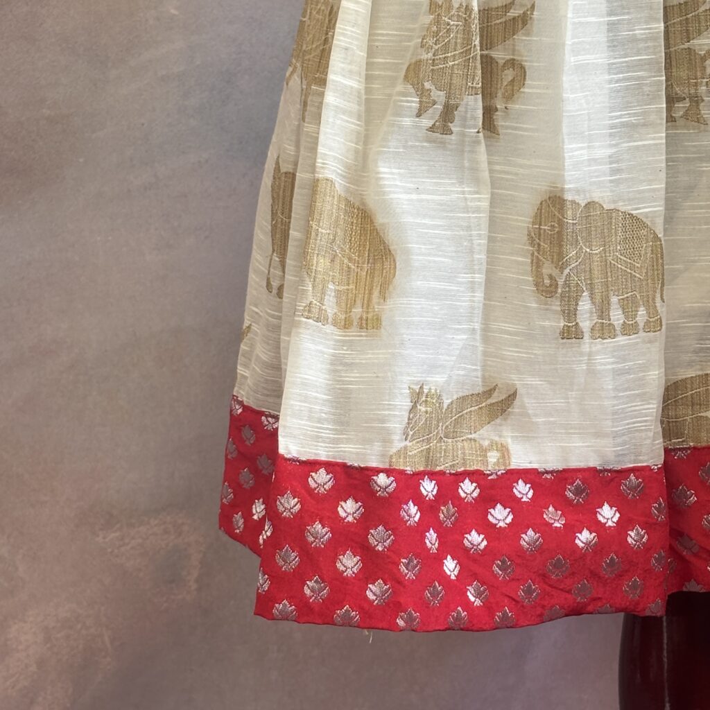 front view Arvi red yoke animal print kids frock