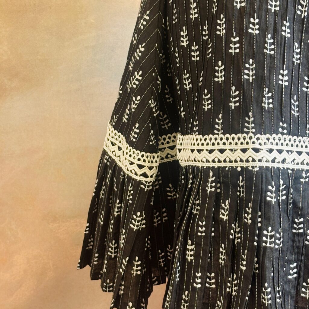 Side view of midnight black A-line cotton frock for girls