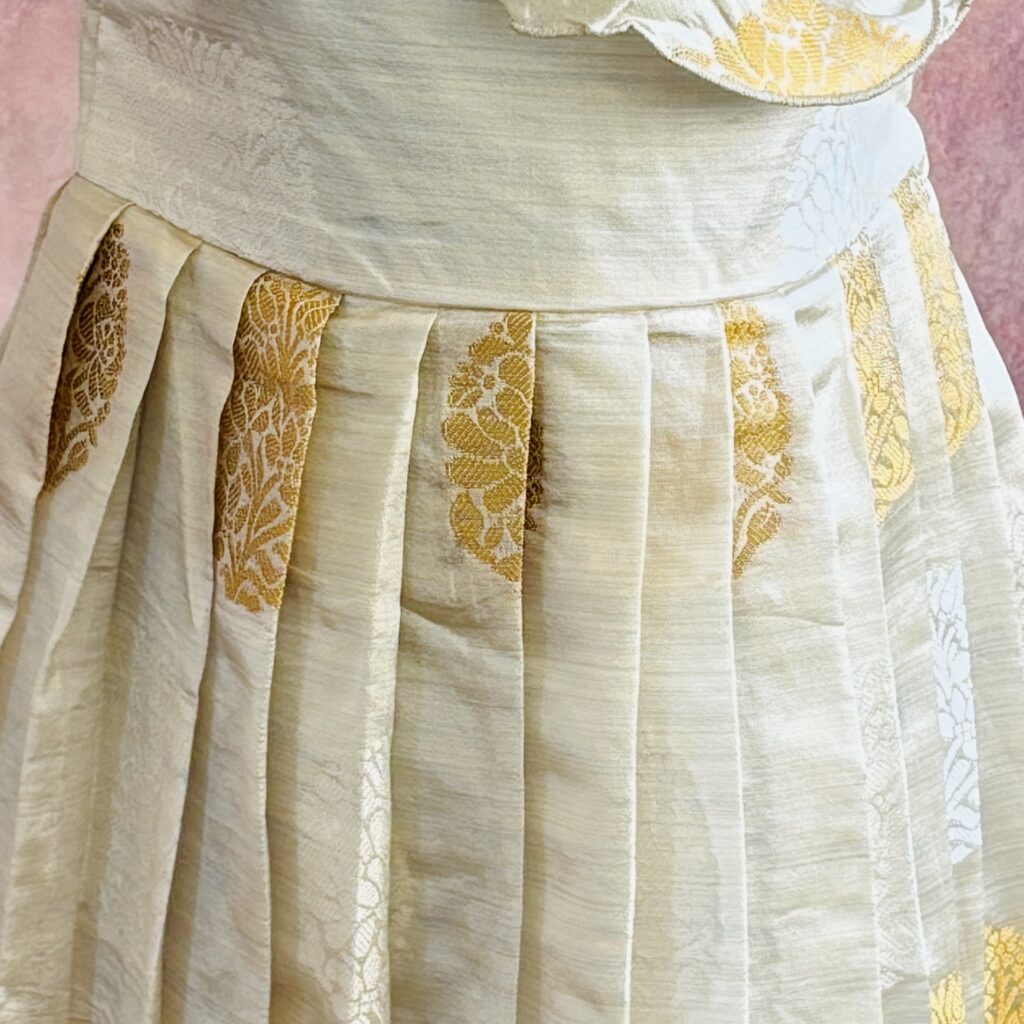 front view Arvi ruffle cream kids frock ready stock1