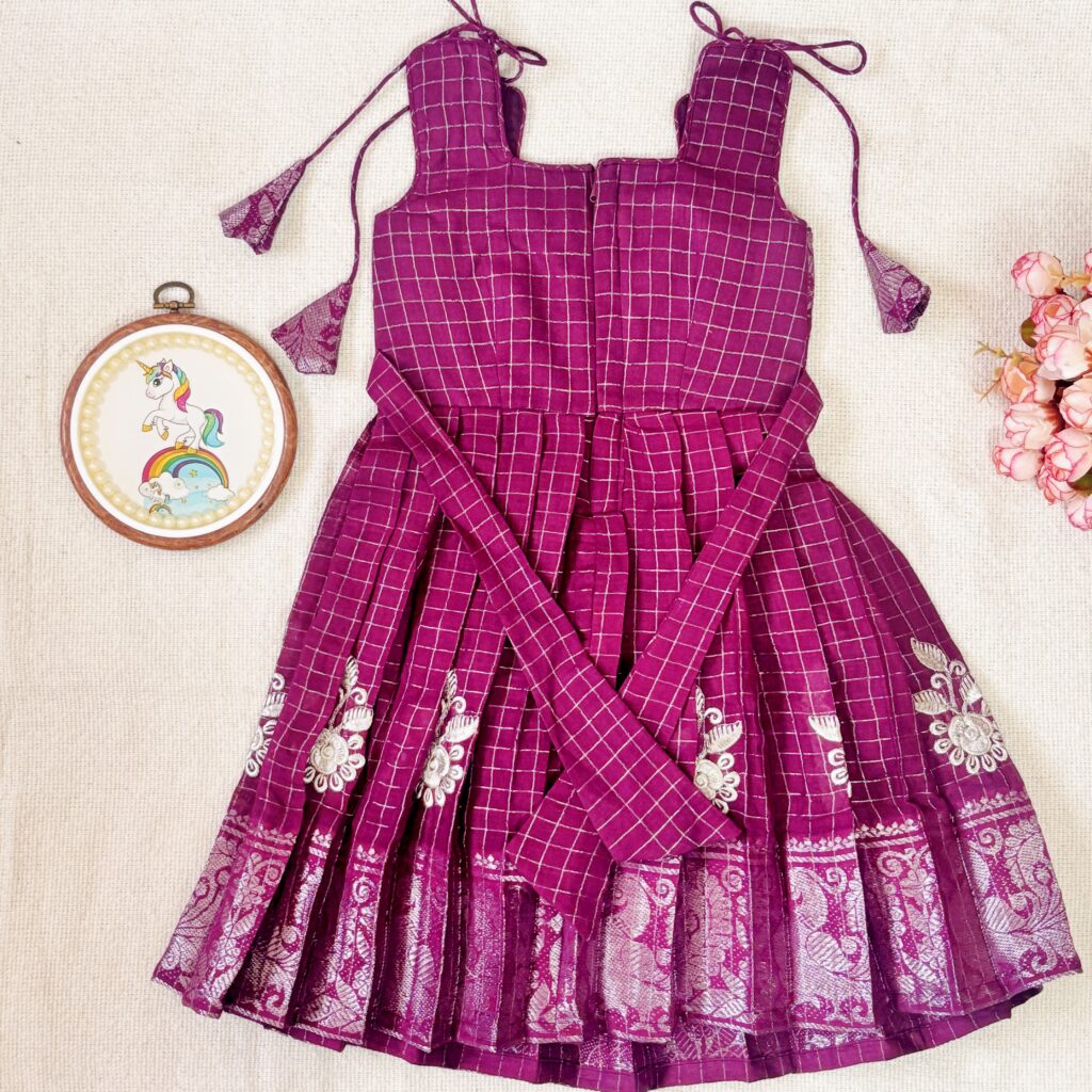 Traditional zari border detail of plum kids festive frock