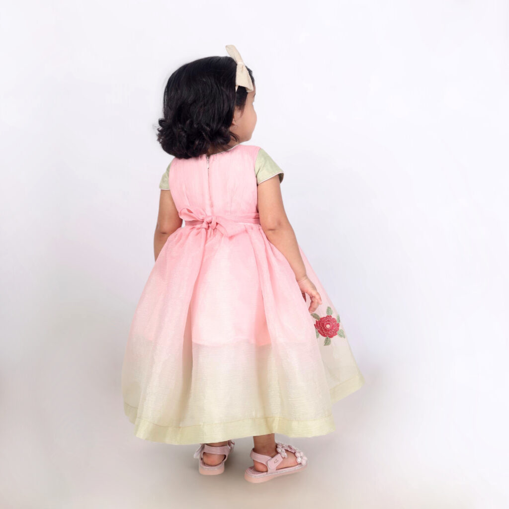 Back view dual tone pink green kids frock with crushed fabric