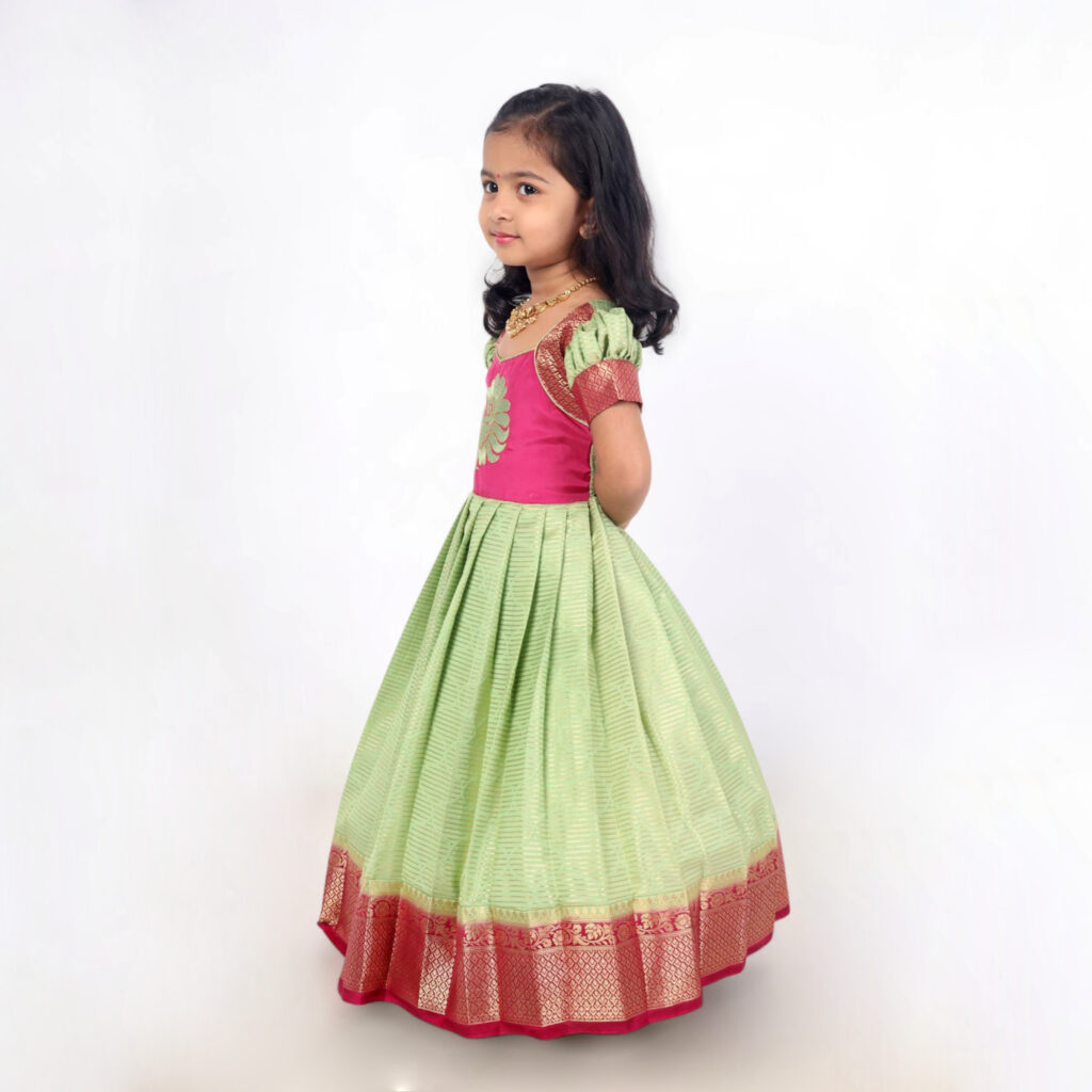 Pink contrast border detail on green crepe silk long gown
