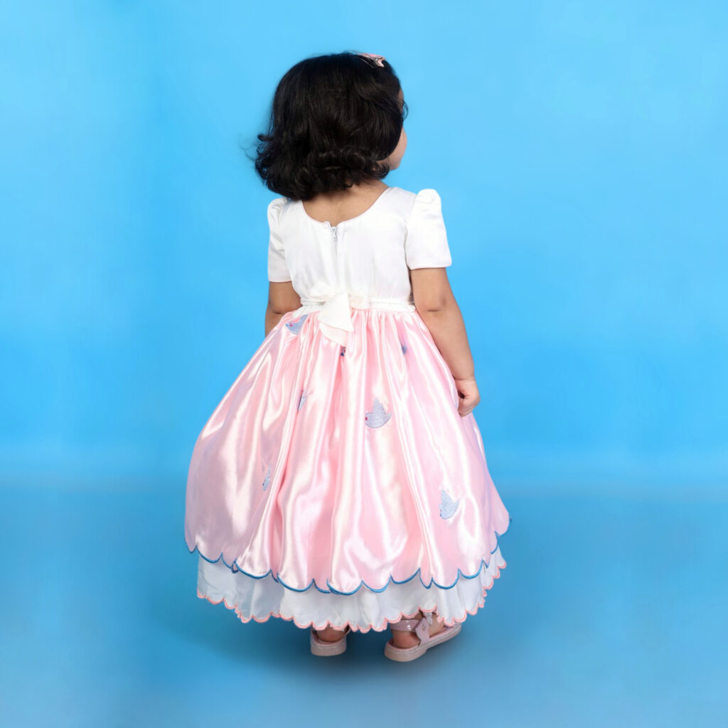 Back view of Aura sustainable organic satin kids frock