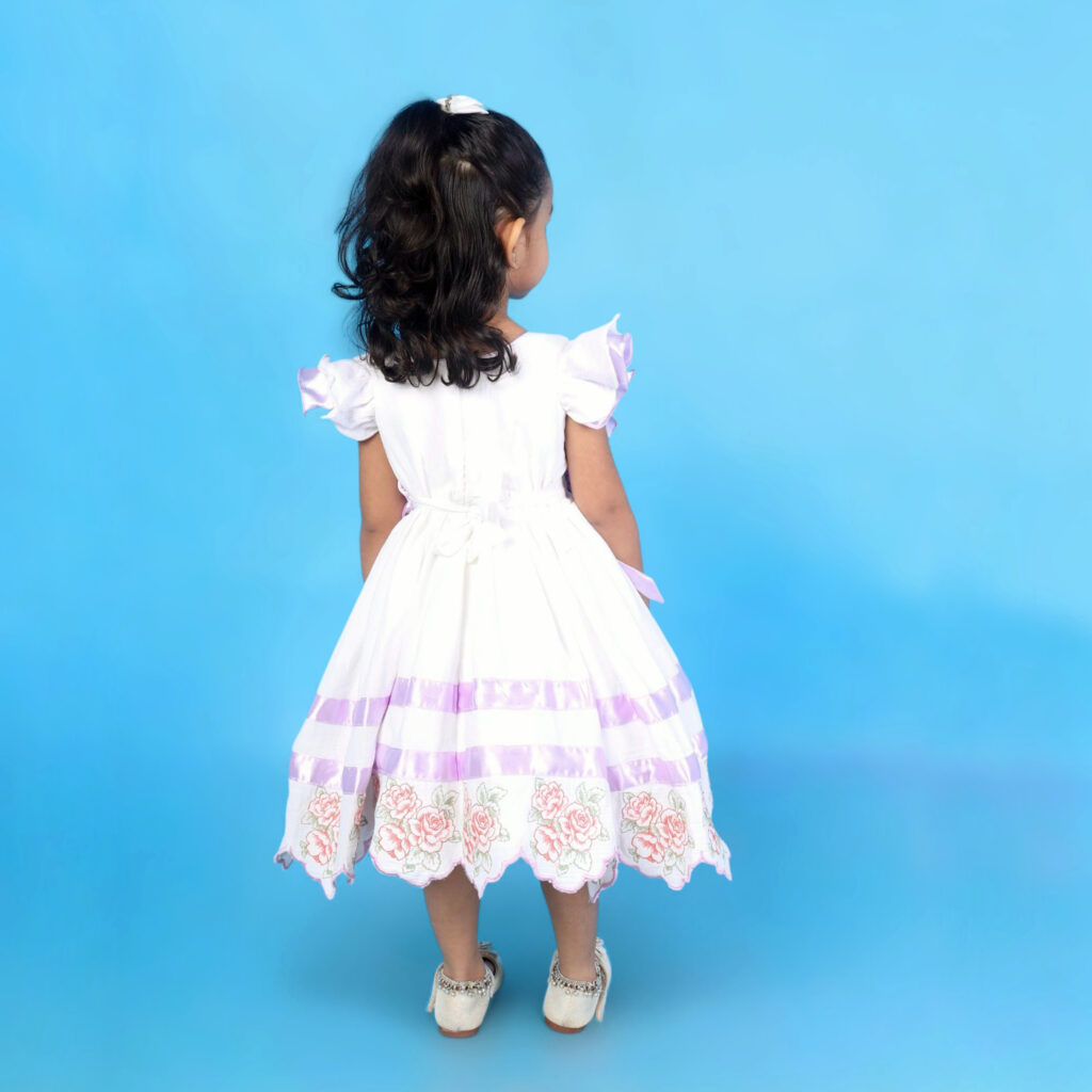Back view of Mira sustainable organic cotton kids frock