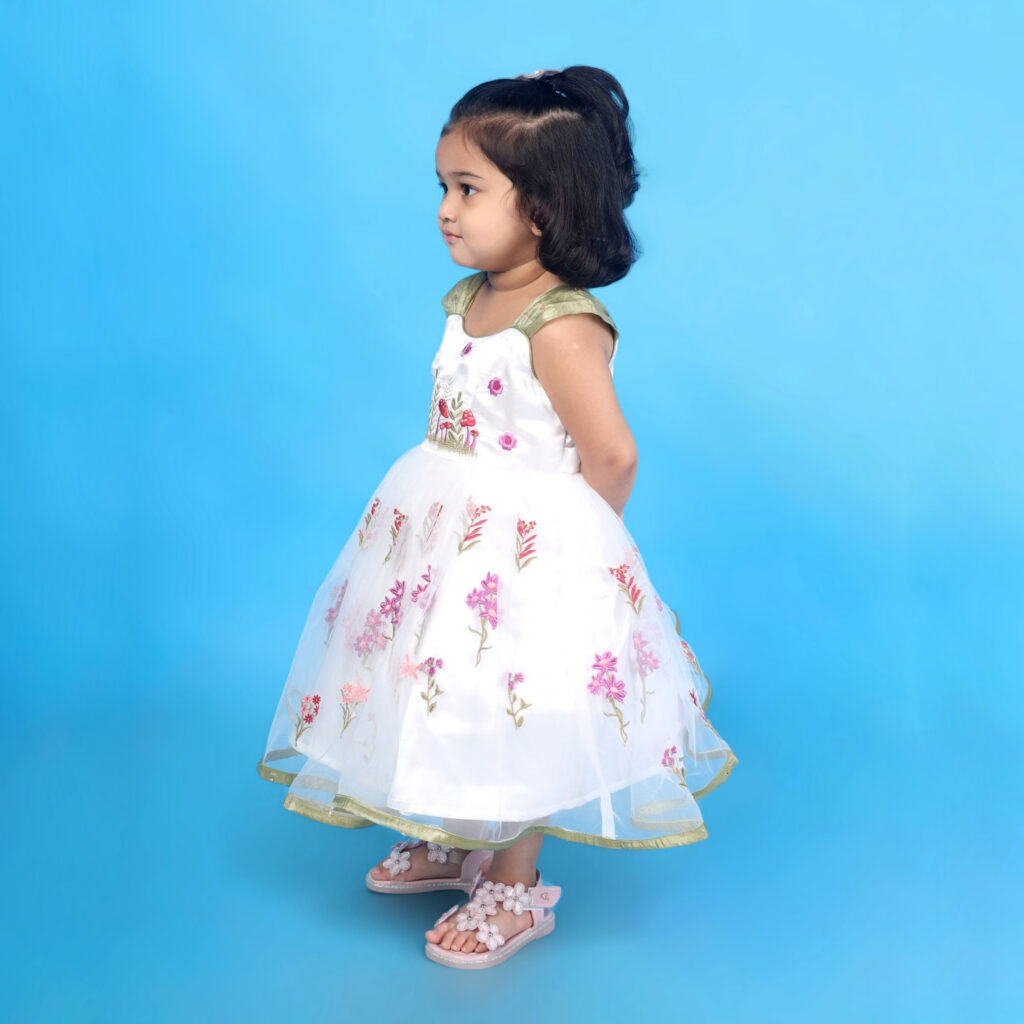 Flared white net floral embroidery kids frock princess look