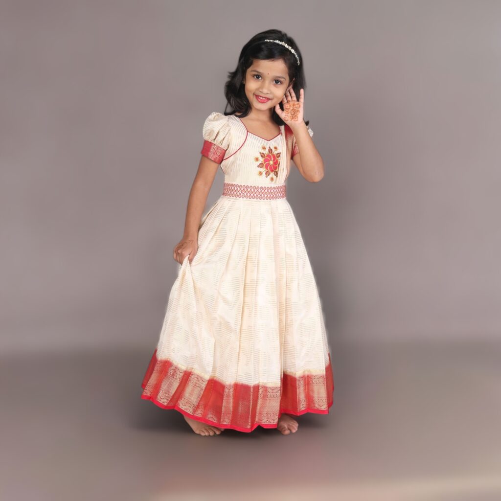 Two piece festive gown with attached pleated shawl for girls