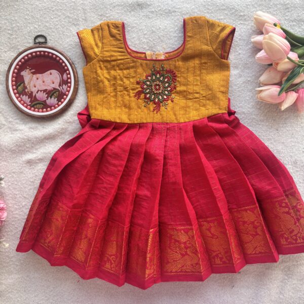 Mustard yellow and red embroidered kids festive frock full front view