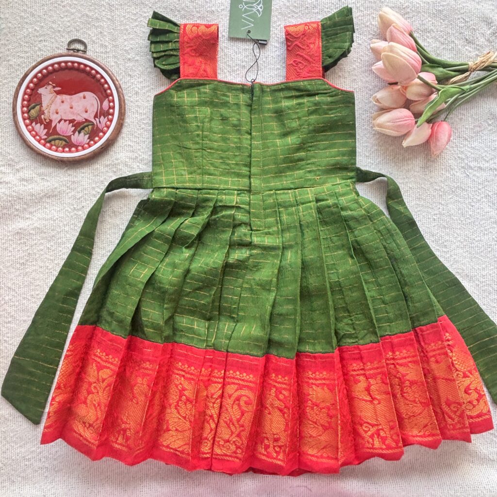 Back view of traditional green Sungudi kids frock