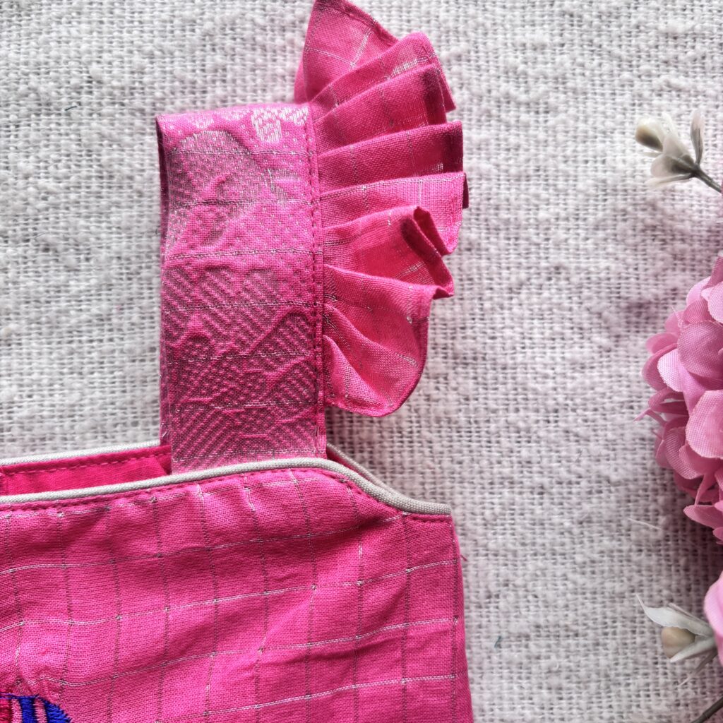 Pink kids festive frock sleeve ruffle detail