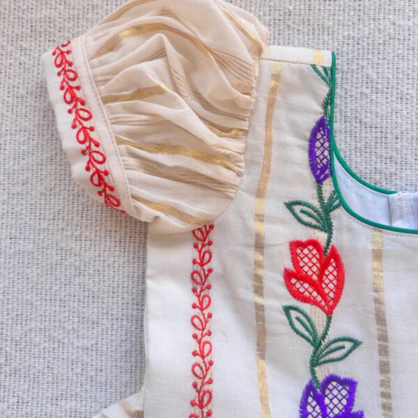 Close up floral stripes design on Nila kids frock