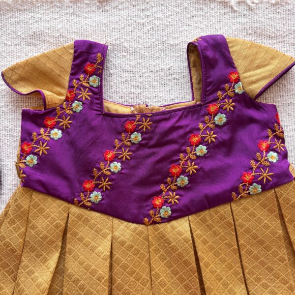 Front view of Taara Little Sunshine purple kids frock