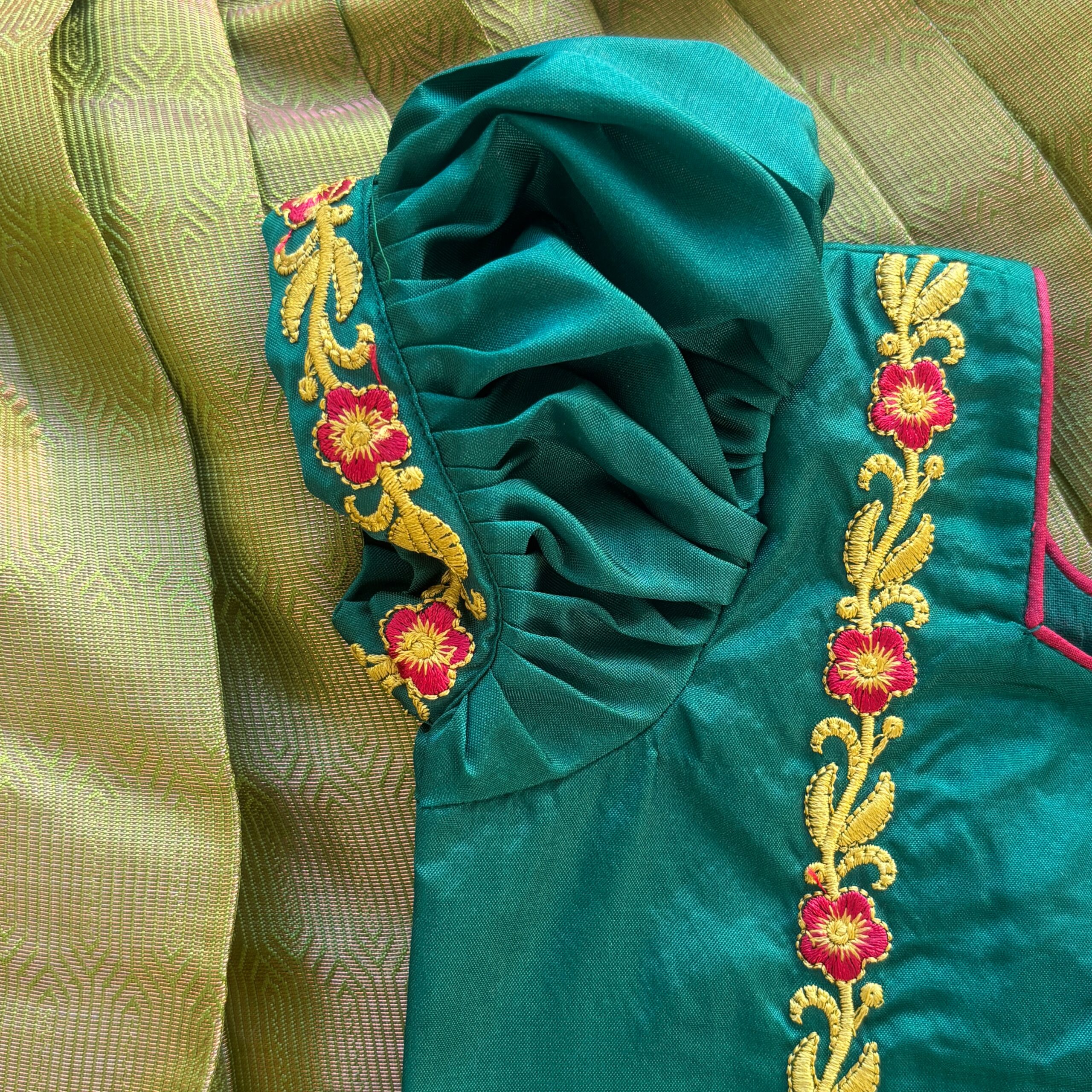 Close up kolam print detail on Taara green skirt and crop top set