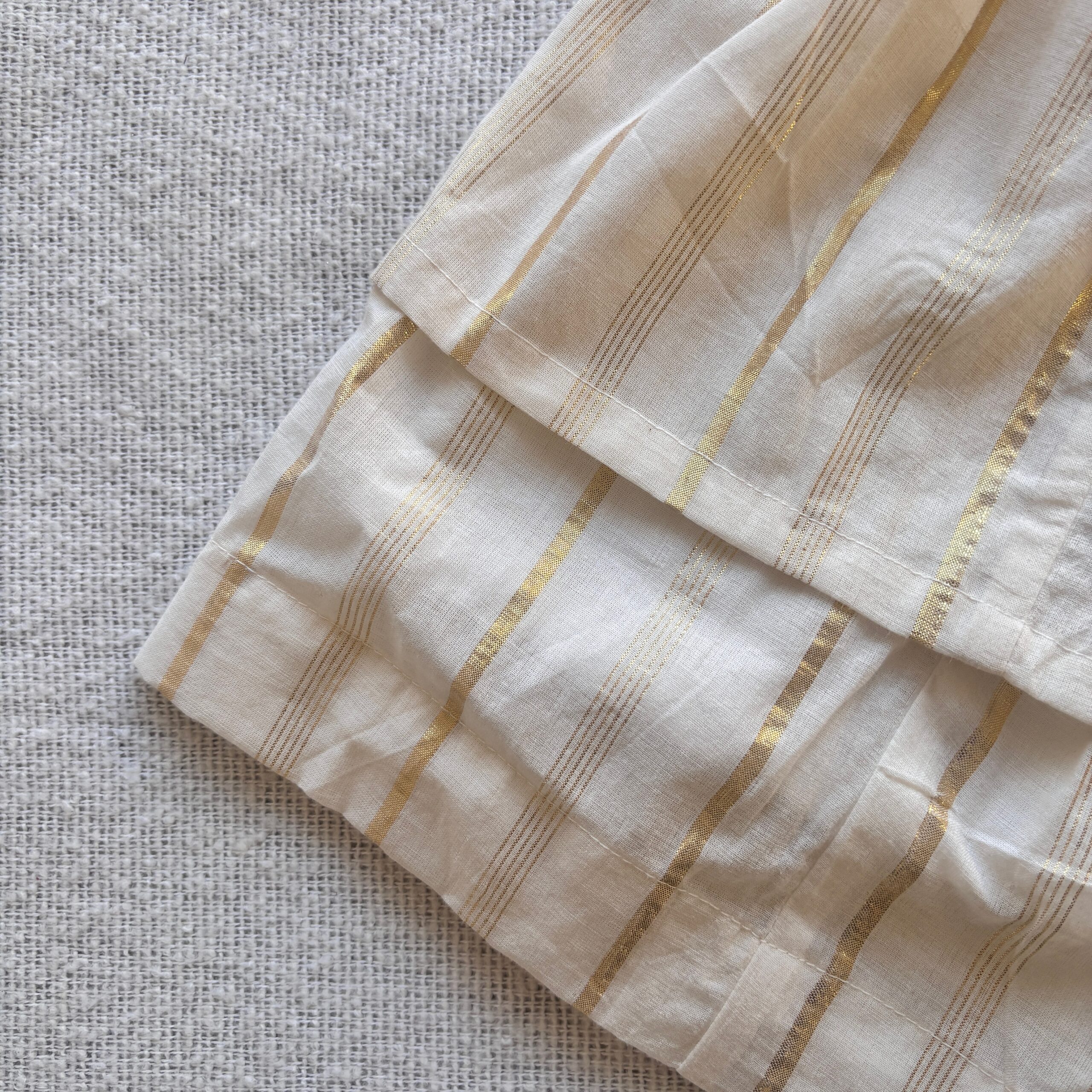 Side view of Nila kids floral stripes frock