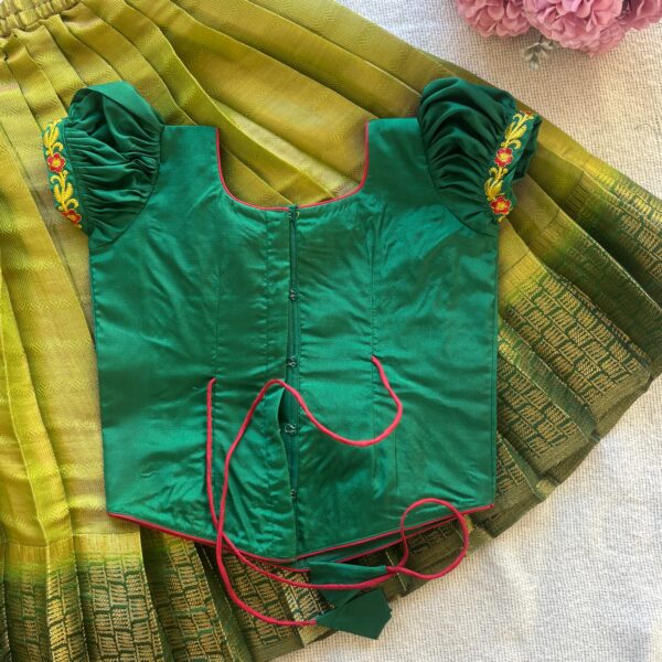 Back view of Taara green kolam skirt and crop top set for girls