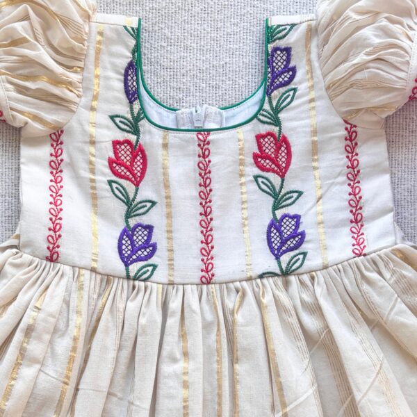 Front view of Nila kids floral stripes frock