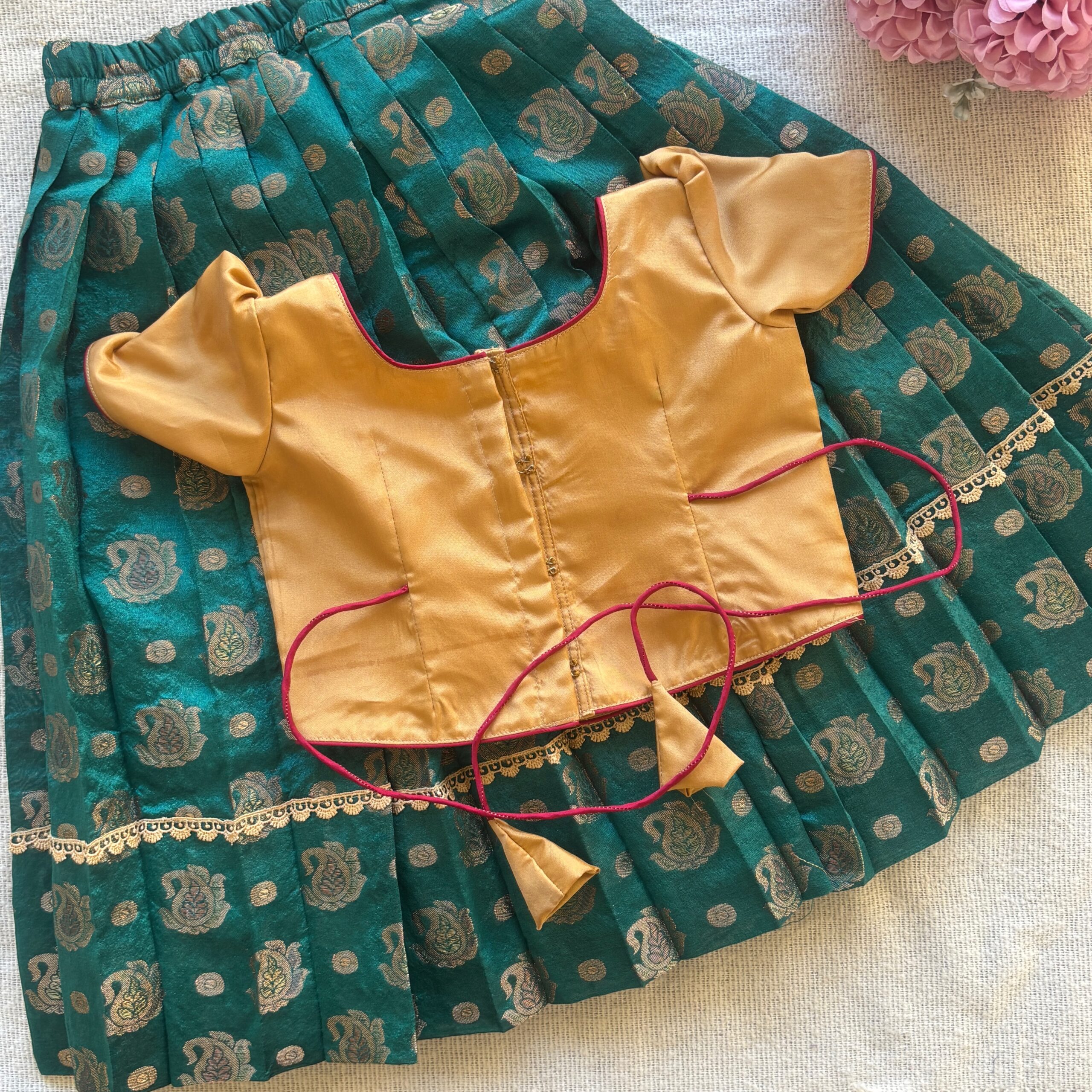 Back view of Taara teal skirt and beige embroidered crop top set for girls