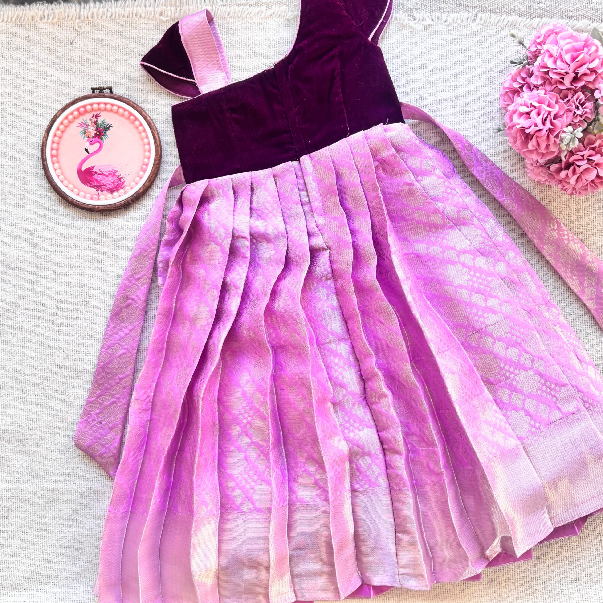 Back view of Taara purple velvet long gown for girls