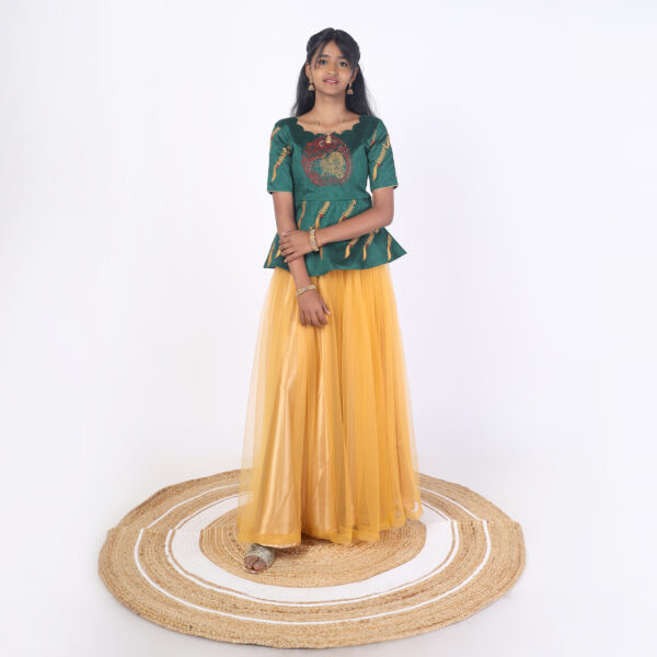 Mustard netted skirt and bottle green peplum top for girls front view