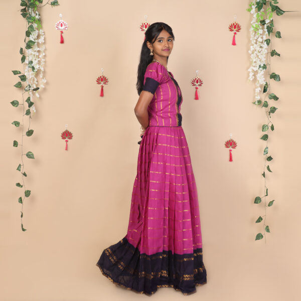 Side view of purple ethnic skirt and top set for girls