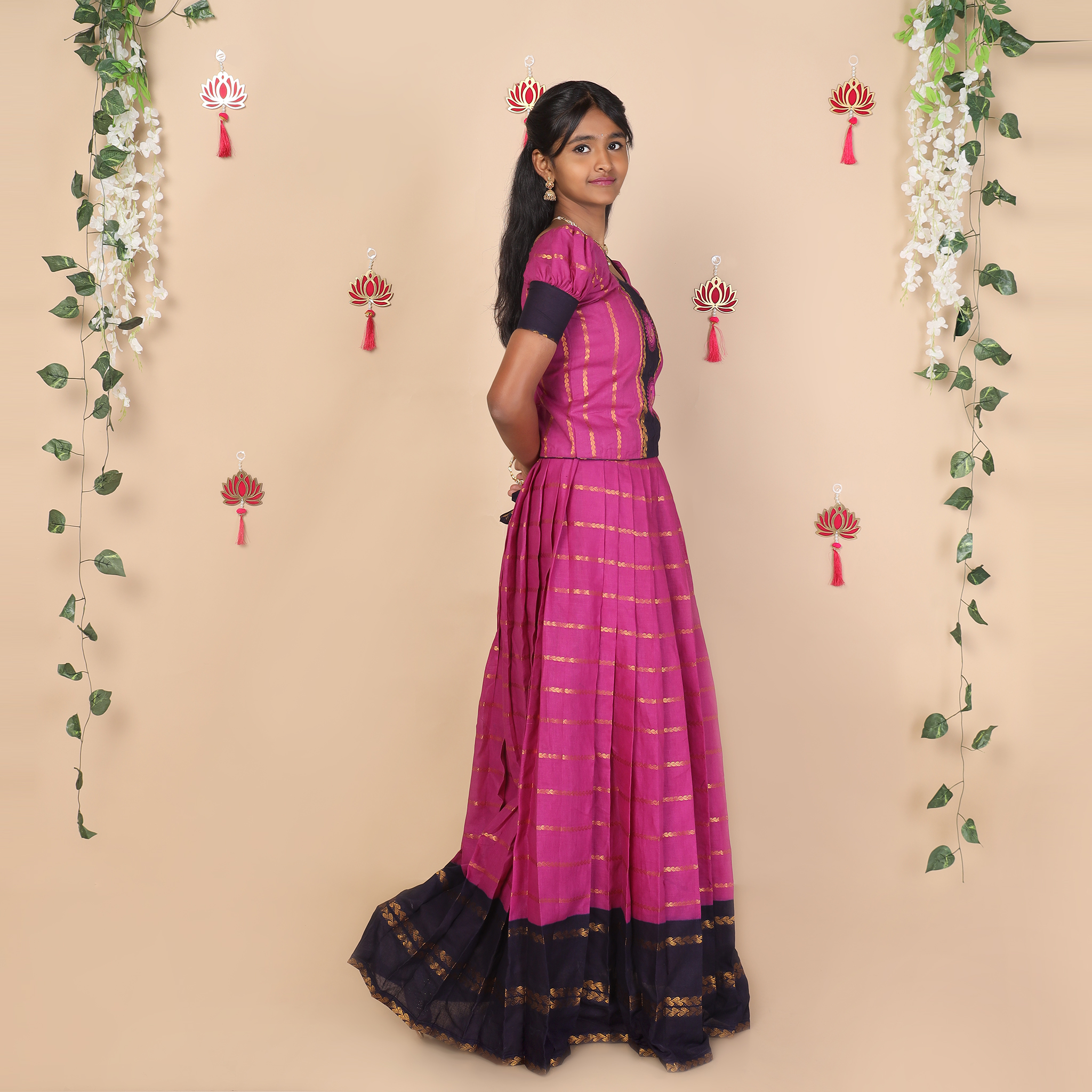 Side view of purple ethnic skirt and top set for girls