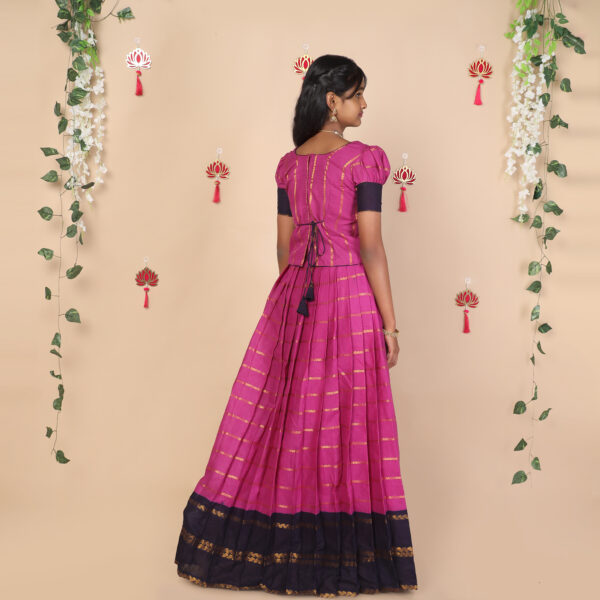 Back view of purple ethnic skirt and top set for girls