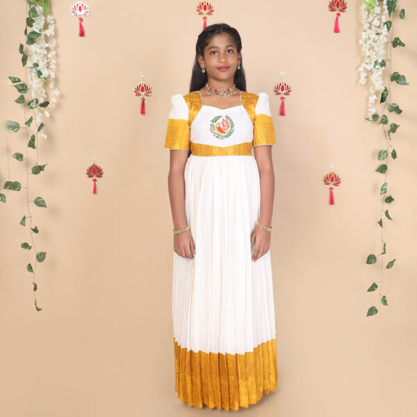 Front view of mustard and white ethnic long gown for girls