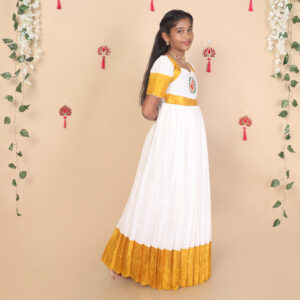 Side view of mustard and white ethnic long gown for girls