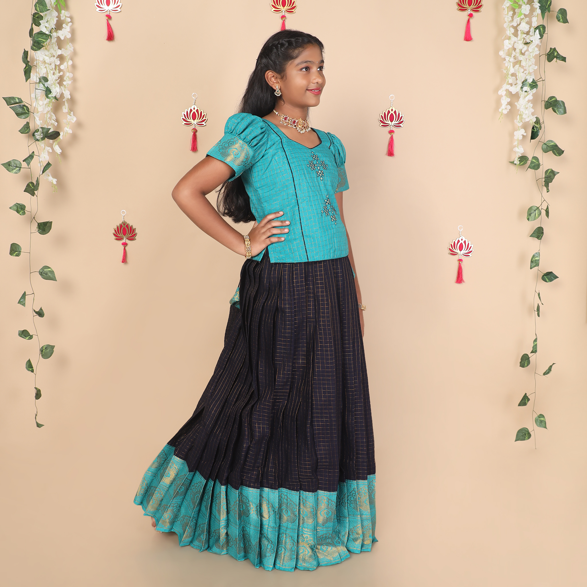 Side view of deep blue and teal ethnic skirt and top set for girls