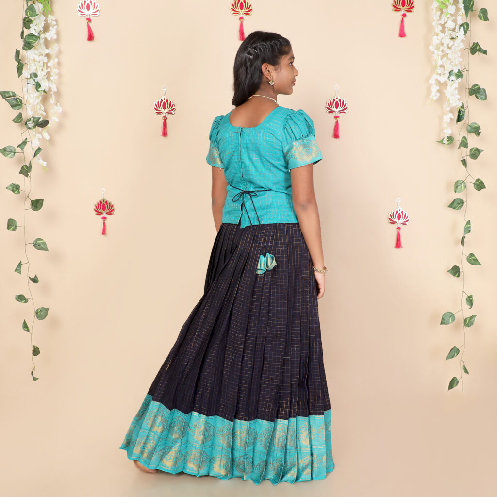 Back view of deep blue and teal ethnic skirt and top set for girls